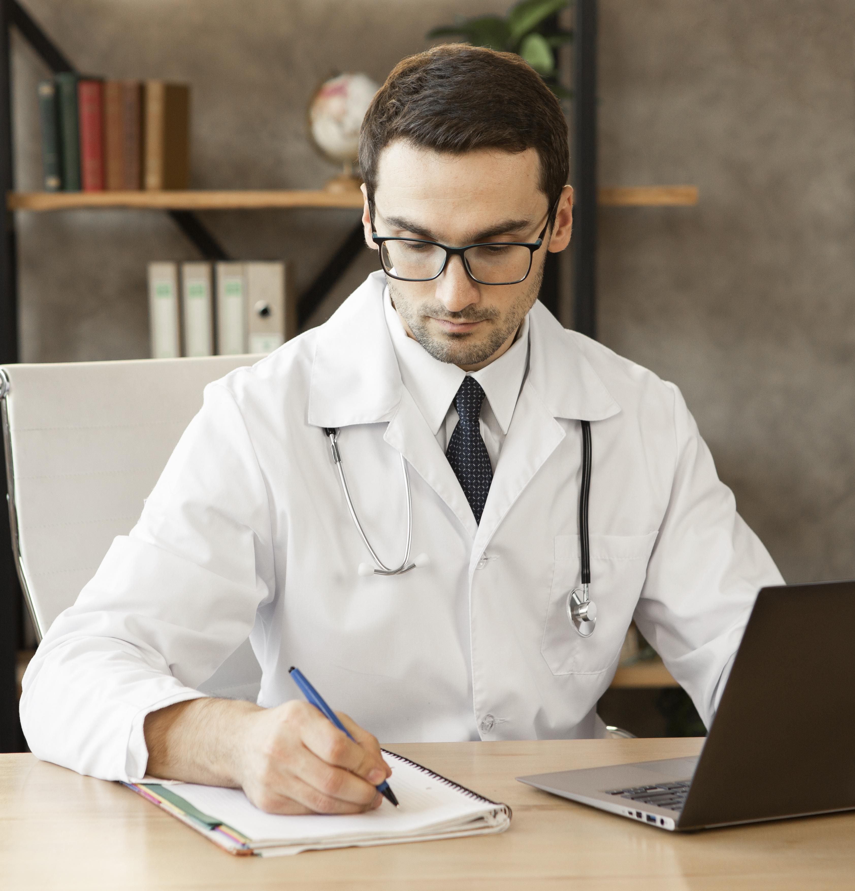Doctor reviewing pre-certification documentation